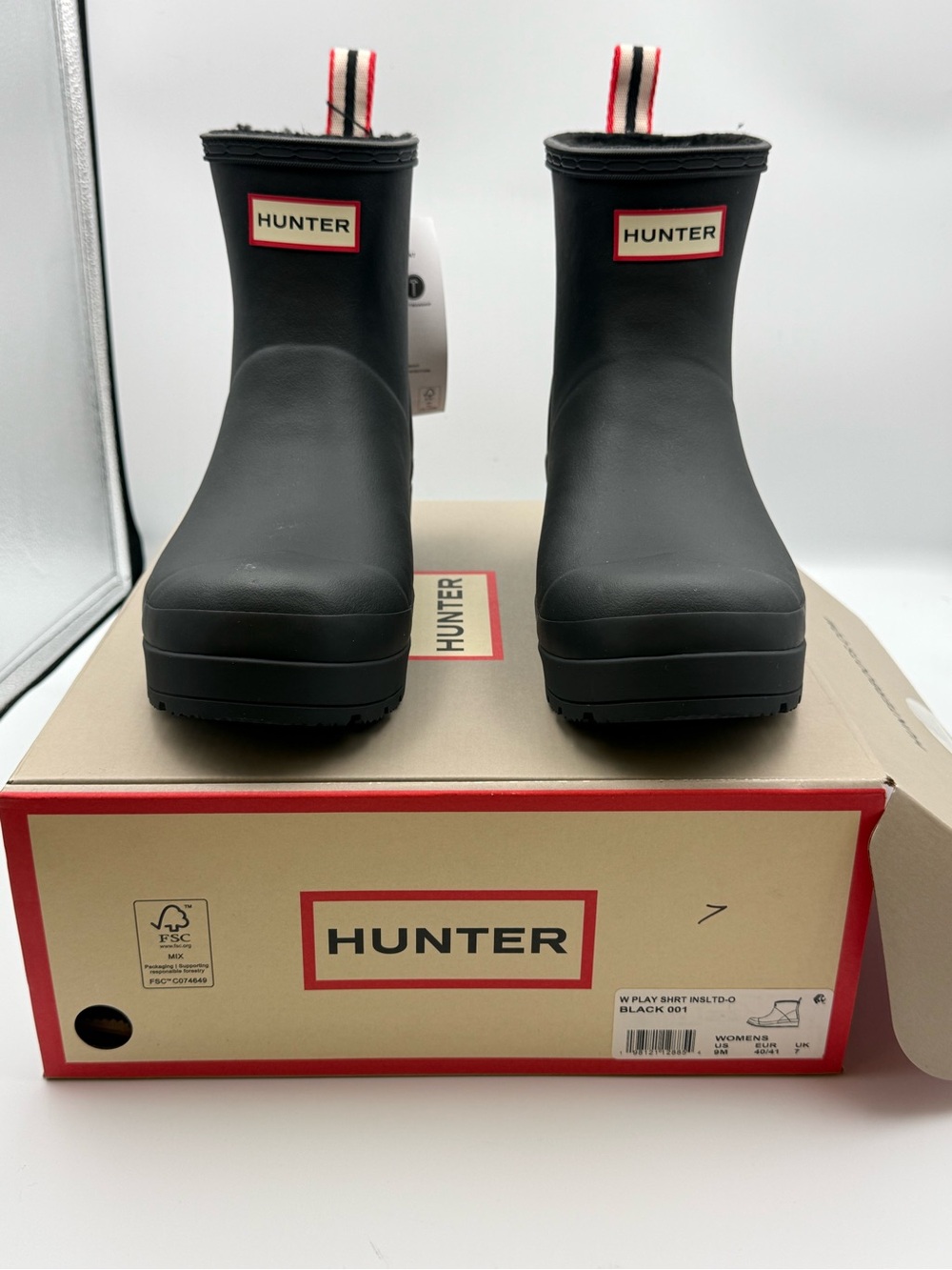 Hunter woman’s Black Ankle Rain Boots with Red-Trim Pull Tabs
